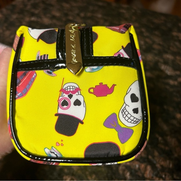 NWOT Betsey Johnson makeup travel bag in vibrant yellow with skull design. - Picture 8 of 10